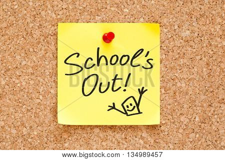 School is Out handwritten on a sticky note pinned on cork bulletin board.
