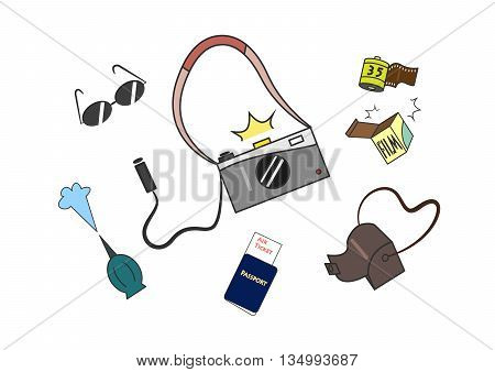Shooting gray camera with wired remote film out from box sunglass air blower passport air ticket and camera leather bag isolated on white background