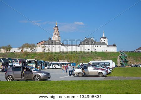 SVIYAZHSK, RUSSIA - MAY 02, 2016: Cars are on the tourist car park beneath the walls of Holy Dormition Monastery