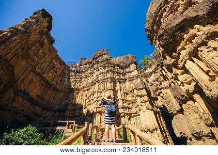 Young Asian Woman Traveler Travelling To Wonderful Soil Cliff Pha Cho At Mae Wang National Park, Doi