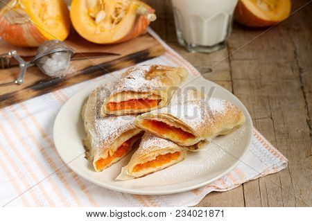 Traditional Romanian Or Moldovan Pumpkin Strudel Vertuta Served With Milk. Rustic Style, Selective F