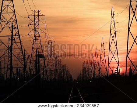 Sunset Over The Railroad With Industrial Overtones