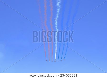 Aerobatic Group Of French Air Force Drawing Tricolor Of French Flag Figure In The Sky