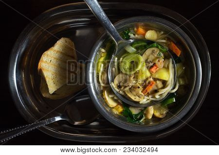 Mushroom Soup In A Metal Plate On A Tray