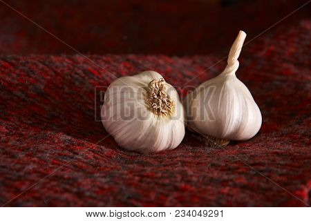 Garlic On A Red Textile. Garlics. Sliced Garlic, Garlic Clove, Garlic Bulb
