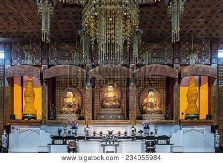 Hacienda Heights, Ca, Usa - March 23, 2018: Closeup Of Altar With Three Buddhas In Main Shrine Of Hs