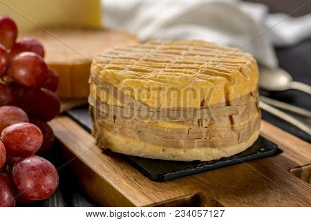 Tasting Of Oldest French Aoc Soft Pudgent Wrapped Yellow Cheese Livarot From Normandy, French Cheese