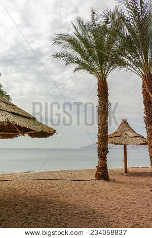 Beautiful Public Sandy Beaches On Red Sea In Eilat With Stro Umbrellas, Luxury Vacation Spa Resorts 