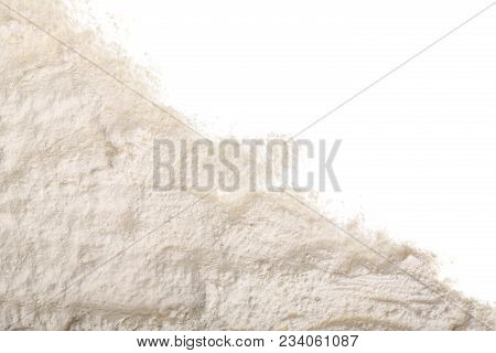 Pile Of Flour Isolated On White Background With Copy Space For Your Text. Top View. Flat Lay.
