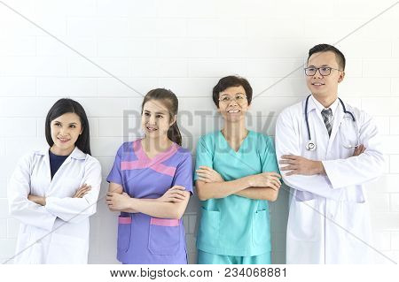Asian  Doctor And Nurse Madical Team In Hopital, Different Ages, Illness Consultant