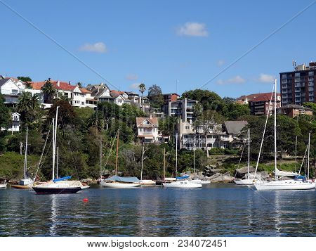Sydney Harbour, New South Wales, Australia-february 5, 2018:  A Collection Of Yachts At Anchor In A 