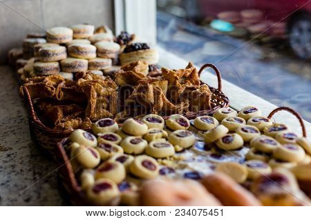 Typical Argentinean Snacks And Treats On Shop Window In Ushuaia, Blurred, Shallow Depth Of Field. Us