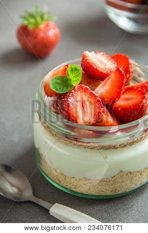 Cheesecake With Strawberries In Jar
