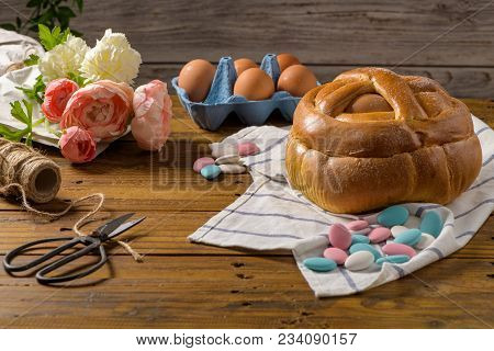 Easter Folar With Egg On Wooden Table Top.