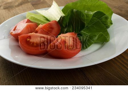 Sliced Tomatoes With Fresh Green Salad