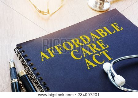 Affordable Care Act Aca And Stethoscope On A Table.