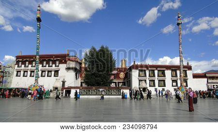 Tibet, China - Aug 30, 2012. Tibetan People Praying In Front Of Jokhang Temple In Lhasa, Tibet. The 
