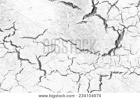 Black Cracks On White And Gray Background. Gray And White Background. Barren Earth. Dry Cracked Eart