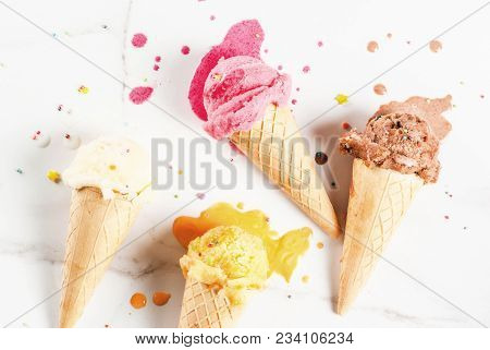 Homemade Berry Vanilla Caramel Chocolate Ice Cream In Waffle Cones, White Marble Background Copy Spa