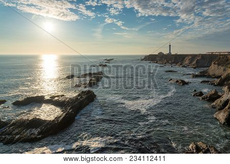 California Coast At Sunset. Point Arena Lighthouse In Mendocino County, Northern California Coast.