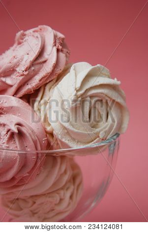 Close Up Pink Homemade Strawberry Marshmallows Or Zephyr. Pink Desert Over Pink Background