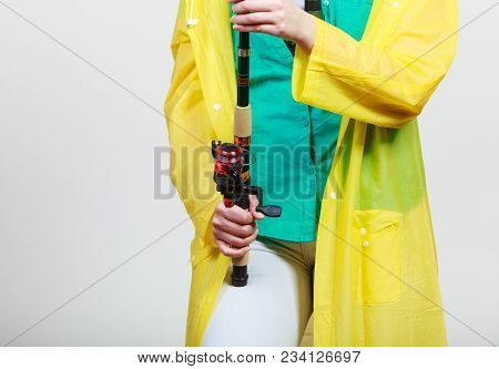 Spinning Sport Equipment Concept. Person Holding Fishing Rod With Float And Waggler With Line.