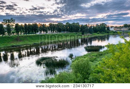 Dramatic Sunset Sky Over The Tvertsa River And Its Picturesque Shores After Storm. Russian Provincia