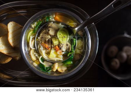 Mushroom Soup In A Metal Plate On A Tray