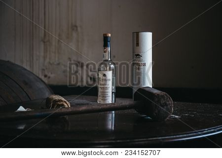 Brora, Scotland - March 22 2018:  Clynelish Whisky Bottle, Wooden Hammer And Cloth Set On A Table In