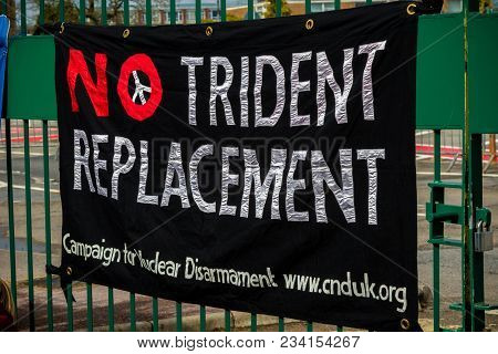 Aldermaston, United Kingdom, 1st April 2018:- Cnd Peace Banners By The Main Gate To The Awe Where Br