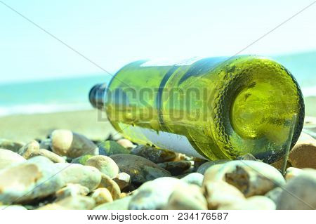 Green Bottle On Pebble Beach South Coast Seaside Uk