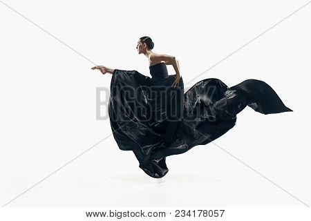 Modern Ballet Dancer Exercising Isolated In Full Body On White Studio Background. Ballerina Or Moder