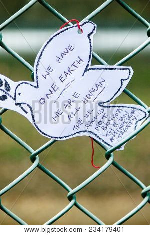 Aldermaston, United Kingdom, 1st April 2018:- Messages Left On The Fence Outside The Main Gate To Th