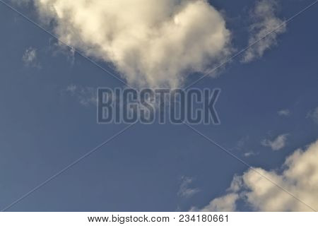 Blue April Sky With Light White Clouds Natural Background