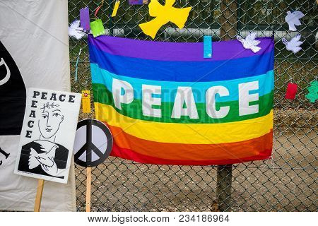 Aldermaston, United Kingdom, 1st April 2018:- Cnd Peace Banners By The Main Gate To The Awe Where Br