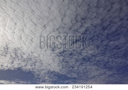 Evening Sky With Light Cirrus Clouds At Sunset