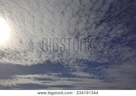 Evening Sky With Light Cirrus Clouds At Sunset