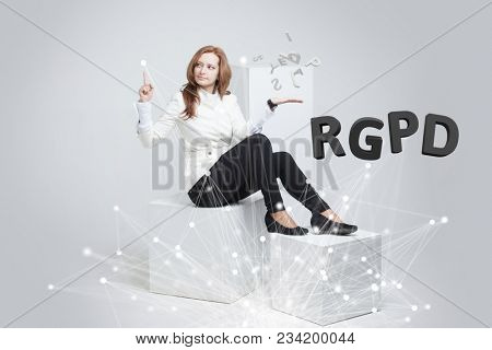 RGPD, Spanish, French and Italian version version of GDPR: Reglamento General de Proteccion de datos. General Data Protection Regulation. Young woman working with information.