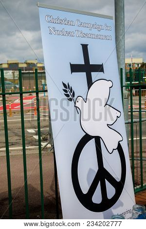 Aldermaston, United Kingdom, 1st April 2018:- Cnd Peace Banners By The Main Gate To The Awe Where Br