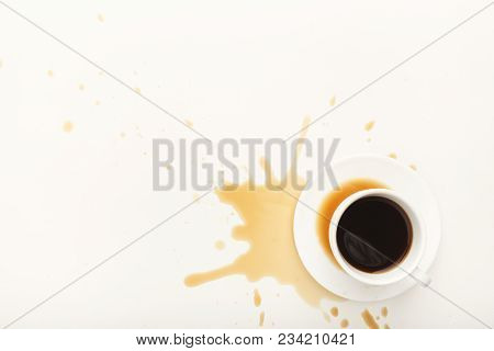 Cup Of Espresso And Coffee Spilt On White Isolated Background, Top View. Mockup For Grunge Advertise