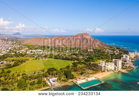 Honolulu, Hawaii. Aerial Skyline View Of Honolulu, Diamond Head Volcano Including The Hotels And Bui