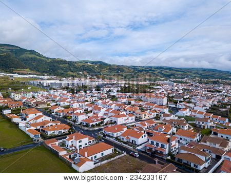 Aerial View On City Mosterios On Island Sao Miguel, The Azores. Beautiful Small Town In Portugal. Az
