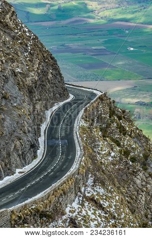 Left Curve In The Road Of A Mountains Port, Basque Country