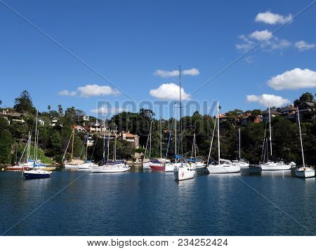Sydney Harbour, New South Wales, Australia-february 5, 2018:  A Collection Of Yachts Moored In An In