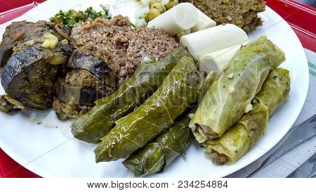 Delicious Arabian food on a plate with many varieties