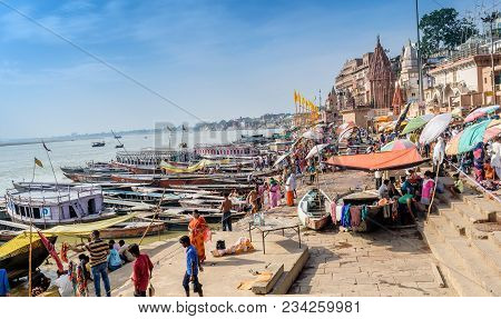 October 14,2017.varanasi,india.  Diverse Group Of People Are Sitting And Making Different Types Of A