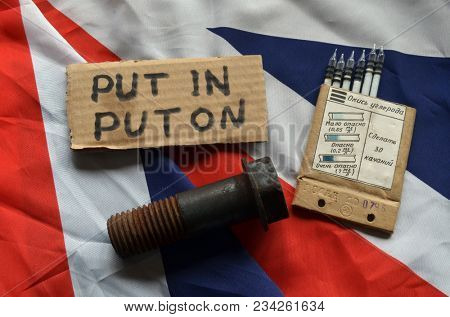 ILLUSTRATIVE EDITORIAL. The scandal about poisoning of former spy Sergei Skripal. Concept. British Flag background.March 24, 2018 in Kiev,Ukraine