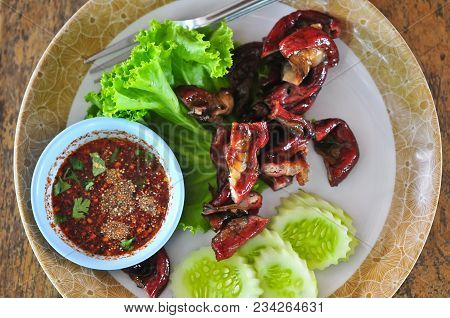 Roasted Pork Chitterlings Served With Vegetable And Spicy Sauce, Thai Food