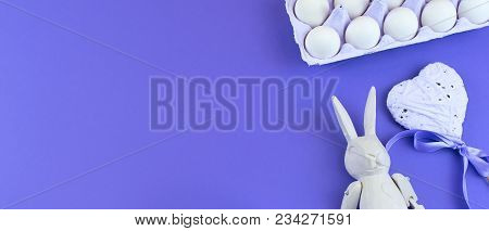 Banner Easter Accessories For Ultraviolet Background. Easter Bunny Vintage Heart Set Of Eggs In A Bo