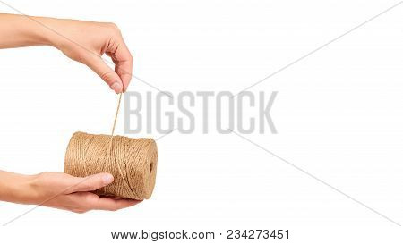 Spool Of Bale Twine Isolated In Hand On White Background. Copy Space, Template.